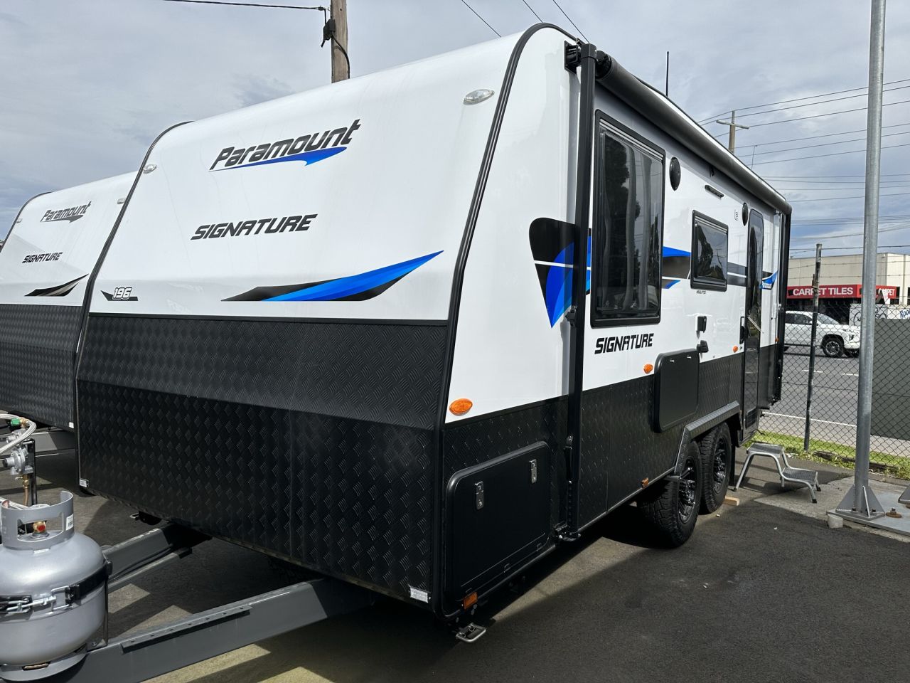 2023 19'6 Paramount Signature Series Rear Door exterior front and side|2023 19'6 Paramount Signature Series Rear Door external storage|2023 19'6 Paramount Signature Series Rear Door kitchen